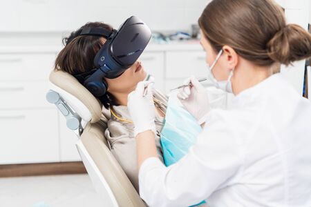 A close up picture of the process of modern dental treatment, wiの写真素材