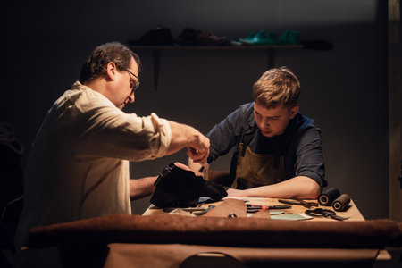 a cute young guy wants to make a gift with his own hands, an experienced shoemaker helps him make...