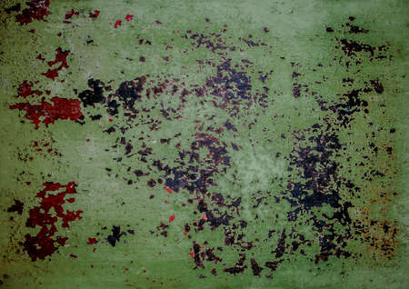 Rust on yellow painted metal surface. Through the peeling and cracked paint show through the layers of previous paint layers, and the iron surface.の写真素材