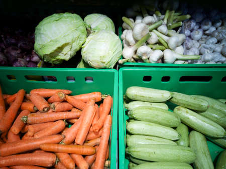Different fresh vegetables in the shop window.の写真素材