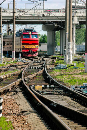 20.06.2019 Bryansk. Russia. The locomotive is moving under the overpass.