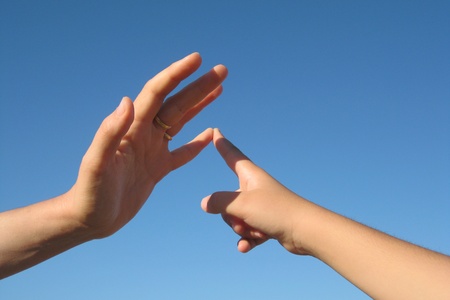 Count with the fingers, child's hand in the hand of an adultの写真素材
