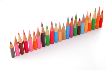 Orderly row  of short pencils of different colorsの写真素材