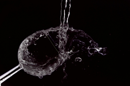 Glass that is filled with fresh waterの写真素材
