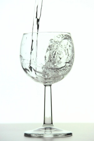 Glass that is filled with fresh waterの写真素材