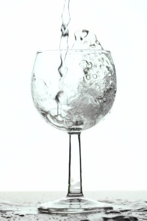 Glass that is filled with fresh waterの写真素材