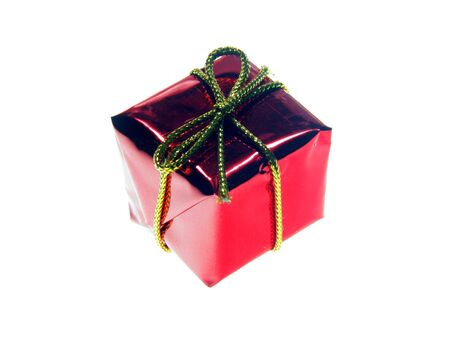Santa Claus red gifts with golden ribbon isolated on white backgroundの写真素材