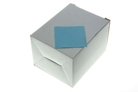 Carton box with memo notes isolated with white backgroundの写真素材