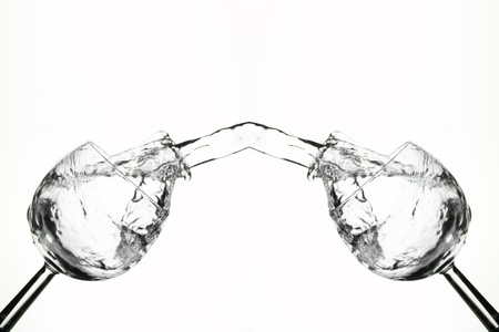 two glasses that are filled with each otherの写真素材