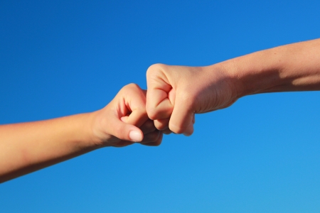 Hands held firmlyの写真素材