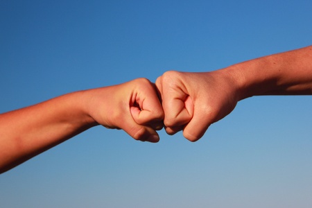 Hands held firmlyの写真素材