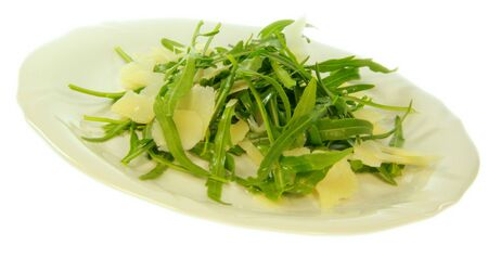 Rocket salad and  cheese with white background の写真素材
