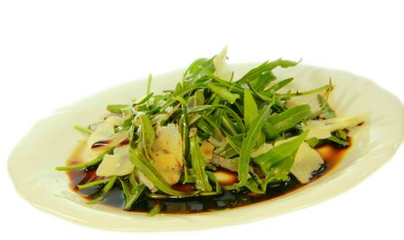 Rocket salad cheese and vinegar with white background の写真素材