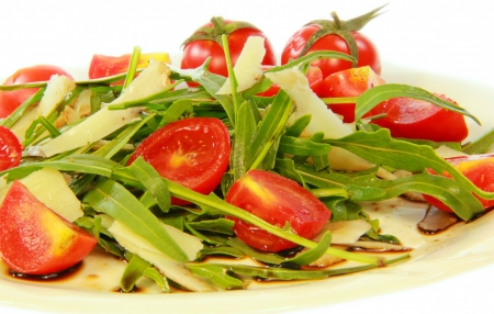 Rocket salad cheese tomatoes  and vinegar with white background の写真素材