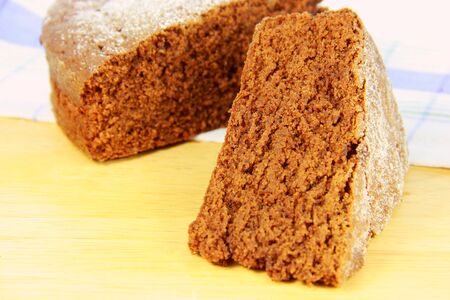 Close-up of a slice of tasty chocolate donutの写真素材