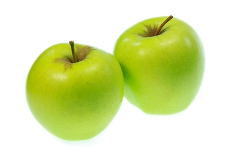 Close up of two delicious green applesの写真素材