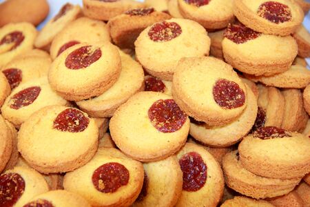 A mountain of sweet cookies with candyの写真素材