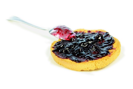 Toast with blueberry jam and white backgroundの写真素材