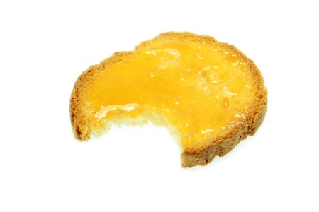 Tasty toast with honey with white backgroundの写真素材