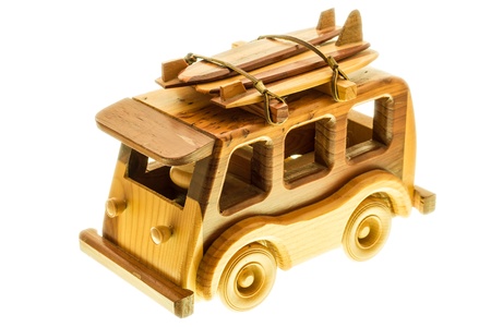 A closeup of a wooden toy wan on white backgroundの写真素材