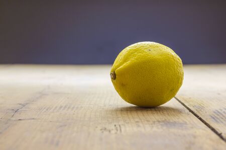 One lemon on the tableの写真素材