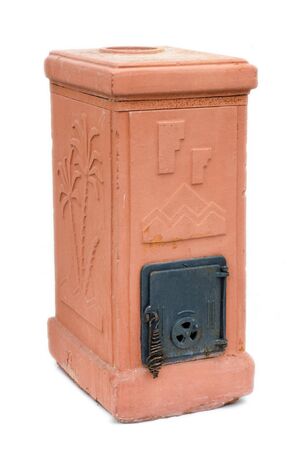 Terracotta stove with white backgroundの写真素材