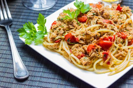 A plate of spaghetti with tunaの写真素材