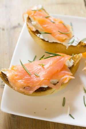 A plate of tarts with smoked salmonの写真素材