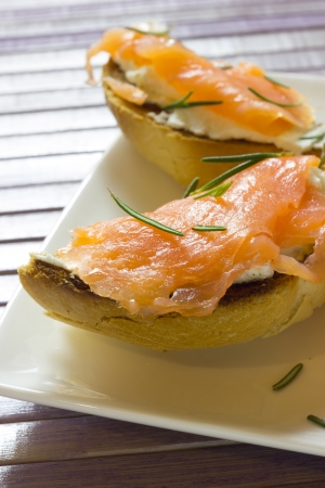 A plate of tarts with smoked salmonの写真素材