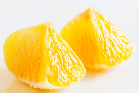 Close up view of same orange segmentsの写真素材