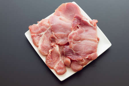 A close up view of same pork steaksの写真素材