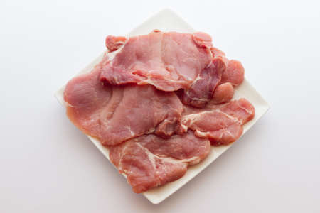 A close up view of same pork steaksの写真素材