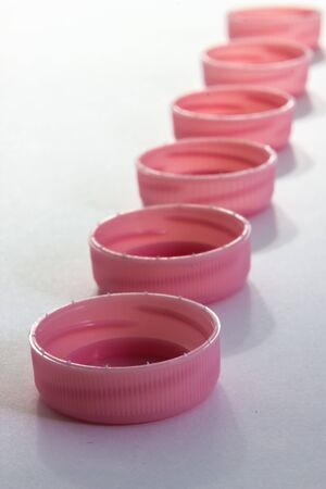 A close up view of same plastic capsの写真素材
