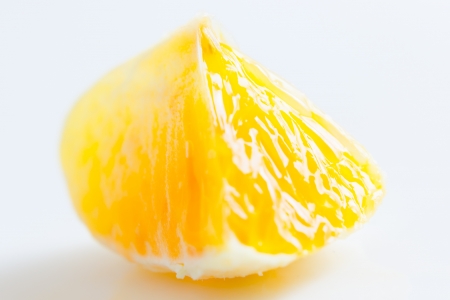 Close up view of same orange segmentsの写真素材