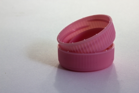 A close up view of same plastic capsの写真素材