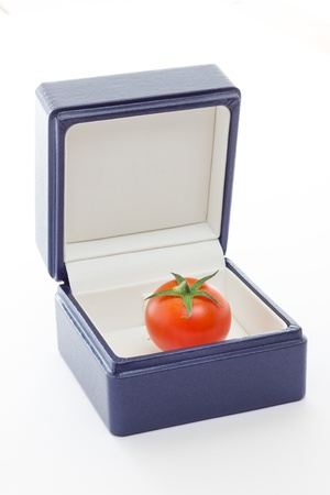 A tomato gift from nature with white background の写真素材