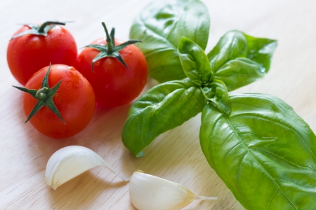 Close up view of bruschetta and ingredientsの写真素材