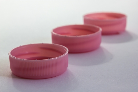 A close up view of same plastic capsの写真素材