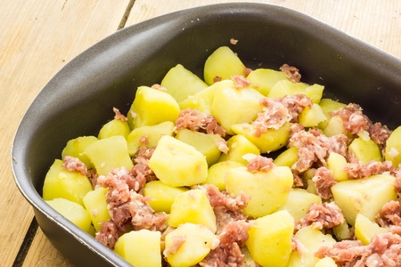 Potatoes with sausage ready for the ovenの写真素材