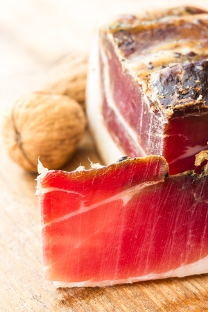 Tasty slices of Italian speck with rosemaryの写真素材