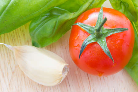 Close up view of bruschetta and ingredientsの写真素材