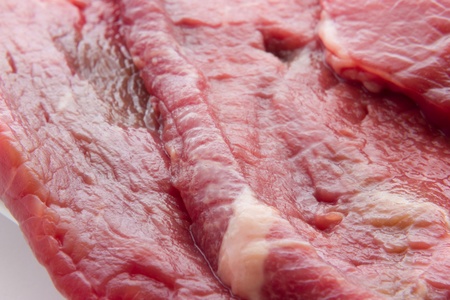 Close up view of same veal steaksの写真素材