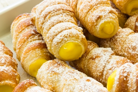 Italian cannoli filled with egg creamの写真素材