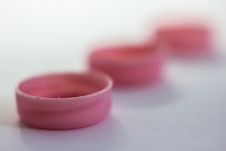 A close up view of same plastic capsの写真素材