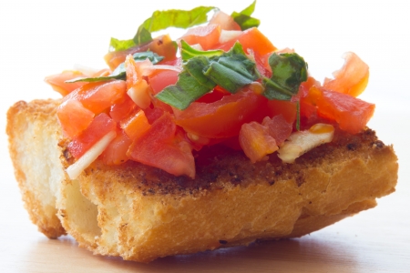Close up view of bruschetta and ingredientsの写真素材
