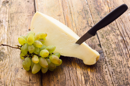Slice of scamorza cheese from Italyの写真素材