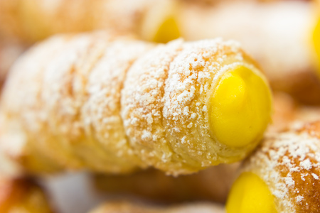 Italian cannoli filled with egg creamの写真素材