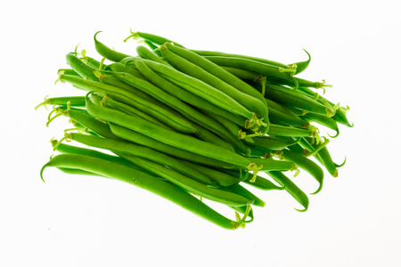 Isolated green beans isolated on white の写真素材
