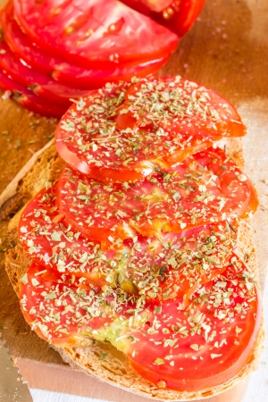 Bread with tomato and basilの写真素材