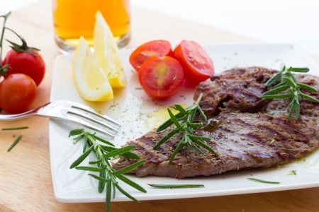 Close up view of same veal steaksの写真素材
